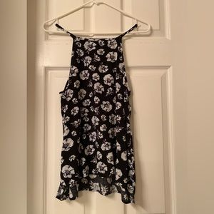 Cotton On x small junior’s lavender colored flowered black top. Used.